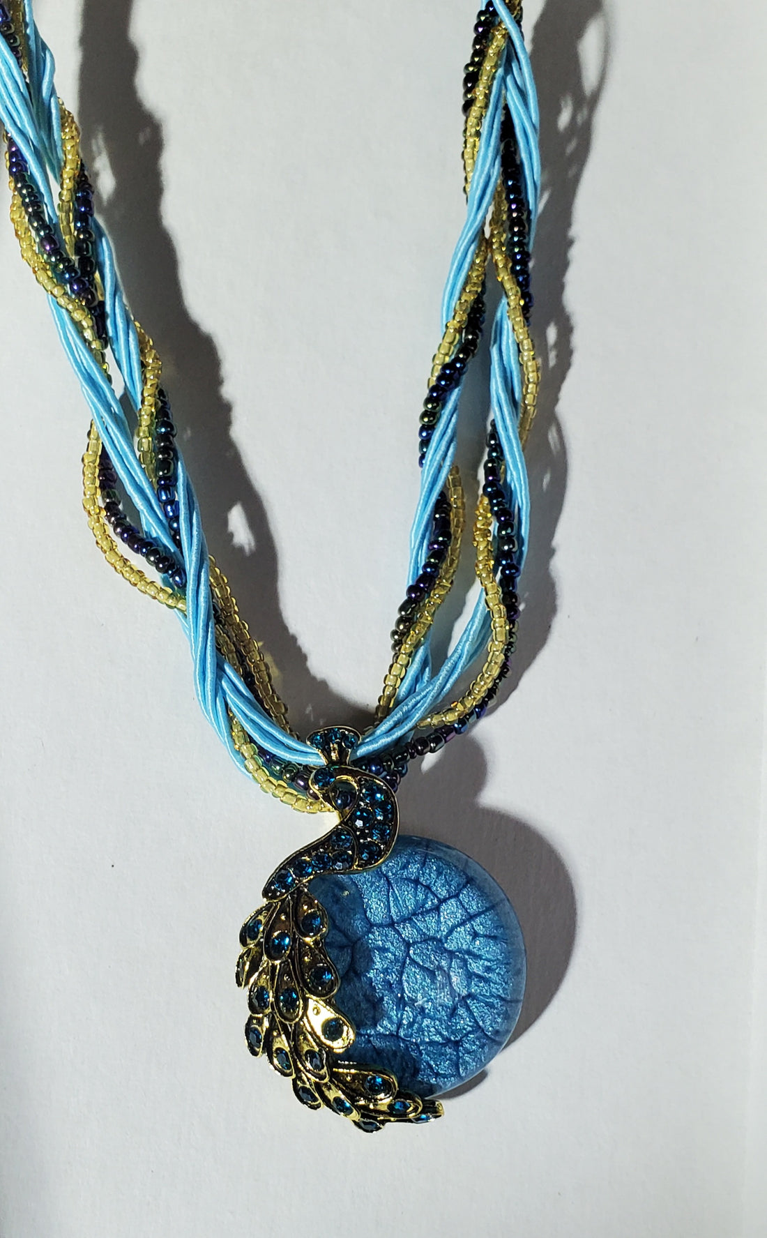 Blue Peacock Necklace - 18" w/Braided Silk Cord, Rhinestone, and Glass Cabachon