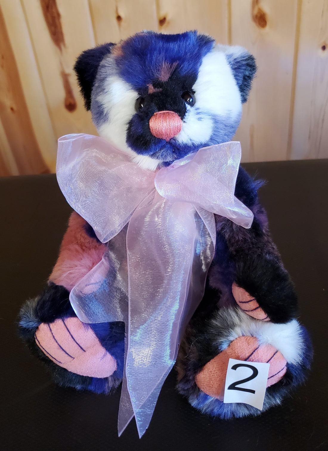 Zuri - 11" Bear w/ blue, black, cream, and pink - by Charlie Bears