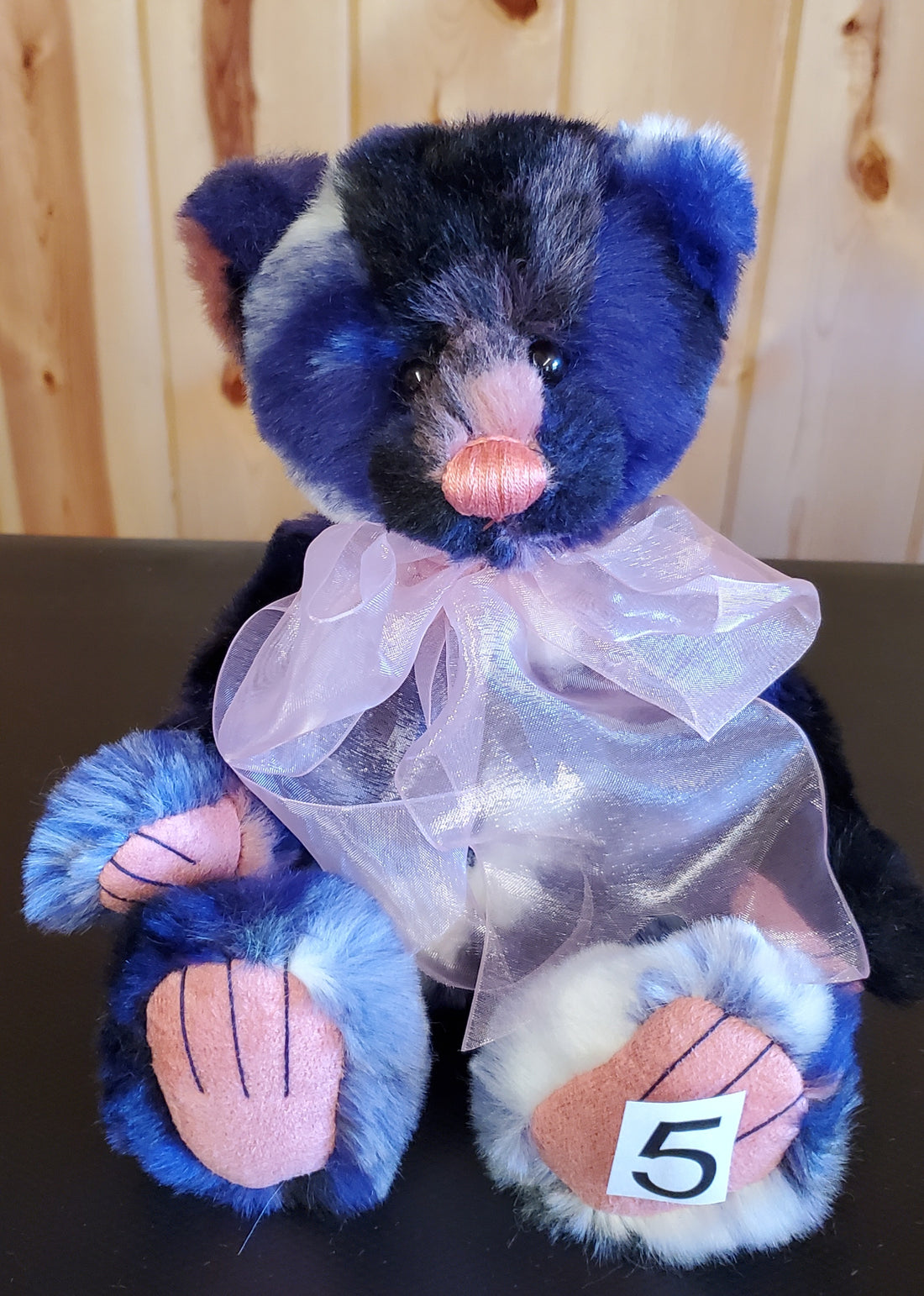 Zuri - 11" Bear w/ blue, black, cream, and pink - by Charlie Bears